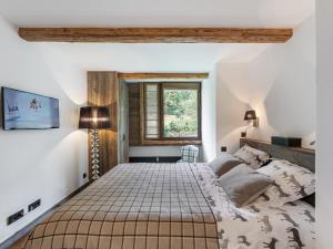 Posteľ alebo postele v izbe v ubytovaní Appartement chaleureux proche pistes de ski et golf à Megève - FR-1-569-67