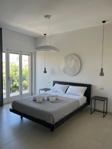 Postel nebo postele na pokoji v ubytování 4B B&B + 37 fotografií