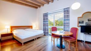 Letto o letti in una camera di Hapimag Resort Ascona