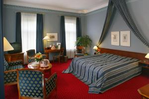 Postel nebo postele na pokoji v ubytování Hotel Sächsischer Hof
