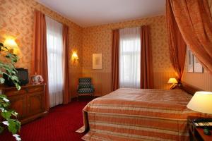Postel nebo postele na pokoji v ubytování Hotel Sächsischer Hof