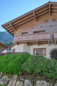 a house with a balcony on the side of it at Haus Nicola in Bad Gastein
