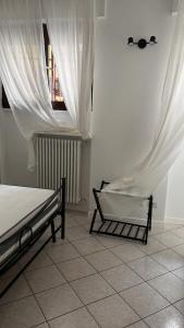 Letto o letti in una camera di JACAM home free parking Como