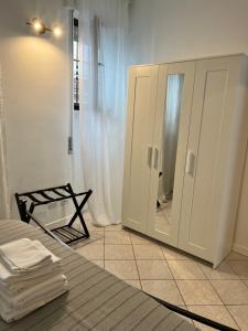 Letto o letti in una camera di JACAM home free parking Como