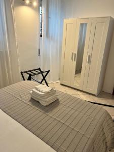 Letto o letti in una camera di JACAM home free parking Como