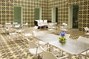 Restauracja lub miejsce do jedzenia w obiekcie NM Lima Hotel
