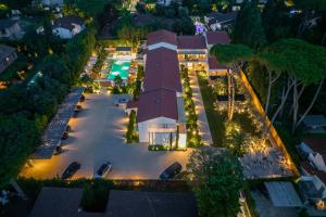 an overhead view of a parking lot at night at Resort Miramonti in Forte dei Marmi