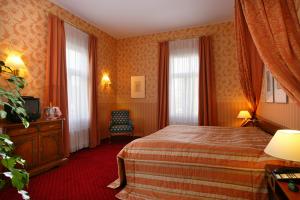 Postel nebo postele na pokoji v ubytování Hotel Sächsischer Hof