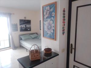 A bed or beds in a room at Caleta Paraiso 127