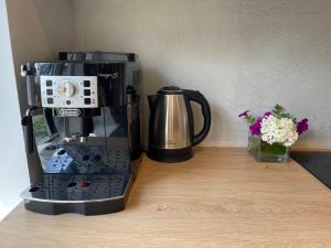 Příslušenství pro přípravu čaje a kávy v ubytování Private apartment