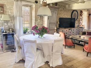 Restavracija oz. druge možnosti za prehrano v nastanitvi Maison du bonheur