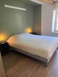 Giường trong phòng chung tại Gîte Anna +4 ảnh