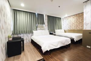 Letto o letti in una camera di Sofu Hotel