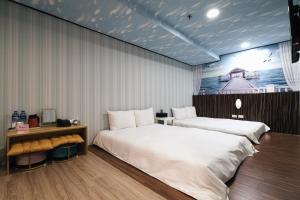 Letto o letti in una camera di Sofu Hotel