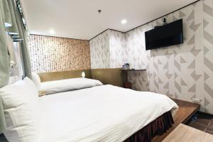 Letto o letti in una camera di Sofu Hotel