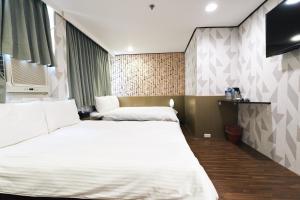 Letto o letti in una camera di Sofu Hotel