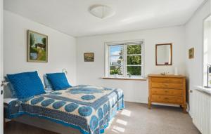 Letto o letti in una camera di Nice Apartment In Bindslev With Wifi