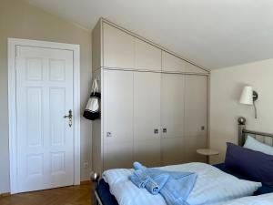 Ein Bett oder Betten in einem Zimmer der Unterkunft Meerblick - Villa Achterkerke
