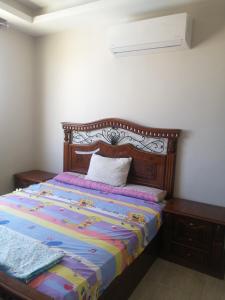 A bed or beds in a room at Premium Sea View Chalet in Azha Ain Sokhna