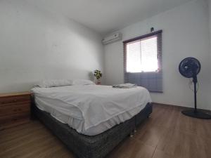 En eller flere senge i et værelse på Finca Mar de Leva