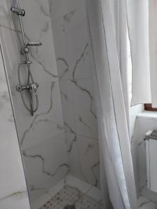 Koupelna v ubytování Hotel Asila
