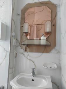 Baðherbergi á Hotel Asila +32 myndir