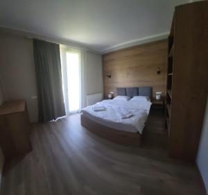 Letto o letti in una camera di Mestia Roots