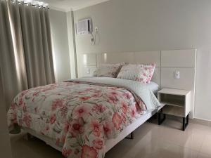 Cama o camas de una habitación en Hotel APART Zuccolotto 203