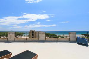 a balcony with a view of the ocean at UHC CASPEL APARTMENTS in La Pineda