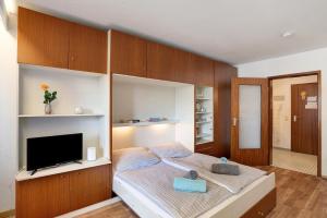 מיטה או מיטות בחדר ב-Appartement Arend