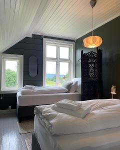 Postel nebo postele na pokoji v ubytování Monshaugen Home