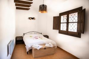 Postel nebo postele na pokoji v ubytování tuGuest Carataunas Apartment Alpujarra VI + 22 fotografií