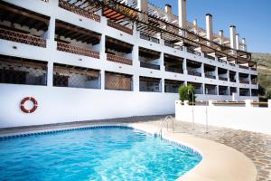Bazén v ubytování tuGuest Carataunas Apartment Alpujarra VI nebo v jeho okolí