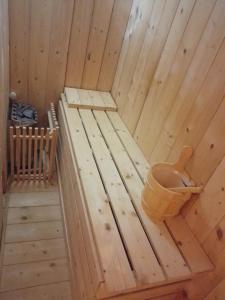 a wooden sauna with a wooden toilet in it at Casa Vacanze MURANUM - B&B in Morano Calabro