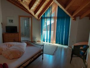 Postel nebo postele na pokoji v ubytování Michl's Villa