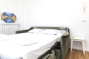 Letto o letti in una camera di [I Host Studio] - Broni 21
