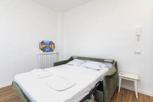 Letto o letti in una camera di [I Host Studio] - Broni 21