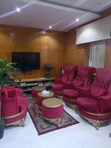 Μια τηλεόραση ή/και κέντρο ψυχαγωγίας στο برج الراية للشقق المخدومة