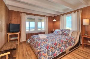 Postel nebo postele na pokoji v ubytování The Schooner