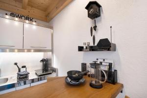 a kitchen with a counter with a coffee maker on it at Gutenburgturm 18qm auf 3 Etagen in Waldshut-Tiengen