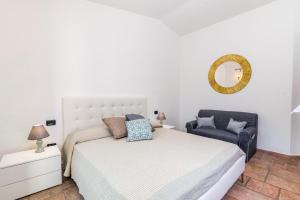 Postel nebo postele na pokoji v ubytování Villetta Teresa