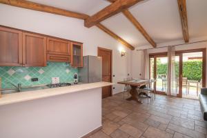 Kuchyň nebo kuchyňský kout v ubytování Villetta Teresa + 4 fotografie