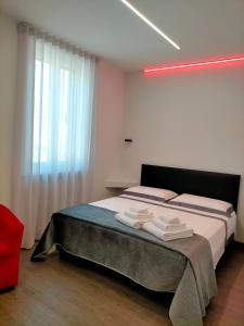 Katil atau katil-katil dalam bilik di Casa Antelami