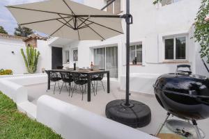 Patio lub wspólna przestrzeń na świeżym powietrzu w obiekcie Casa Alejandro