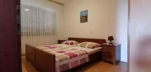 Posteľ alebo postele v izbe v ubytovaní Apartments in Crikvenica 43359