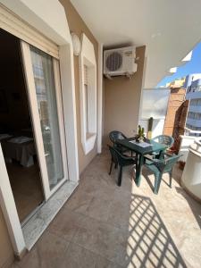 A balcony or terrace at B&B Kalypso