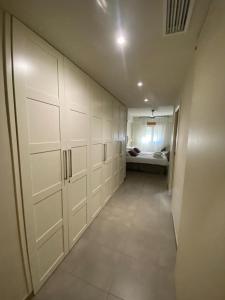 A bed or beds in a room at Apartamento Centro Sevilla Guadalquivir