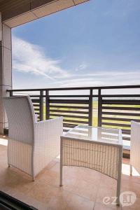 A balcony or terrace at Sun Shine B&B