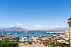 a view of a harbor with boats in the water at Al Papavero Rosso in Castellammare di Stabia