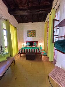 Postel nebo postele na pokoji v ubytování Les Terrasses d'Essaouira - Yoga Studio